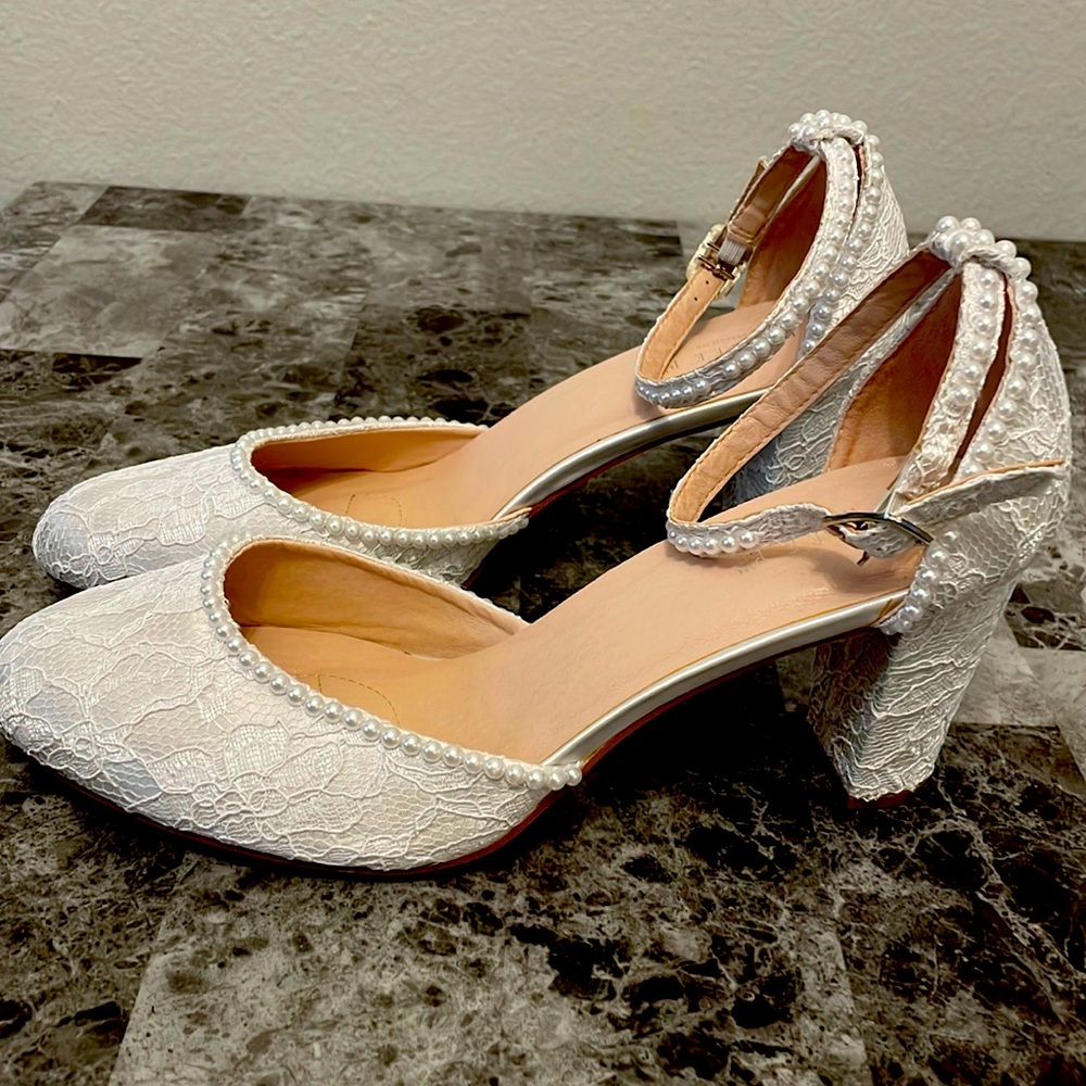Beautiful pearl accent Wedding heels. Light ivory